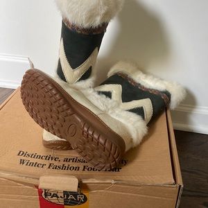 White authentic fur boots with rubber sole